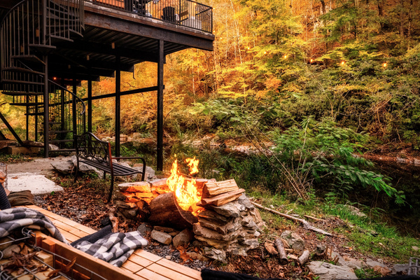 Enjoy a firepit conversation with your loved ones by the river!