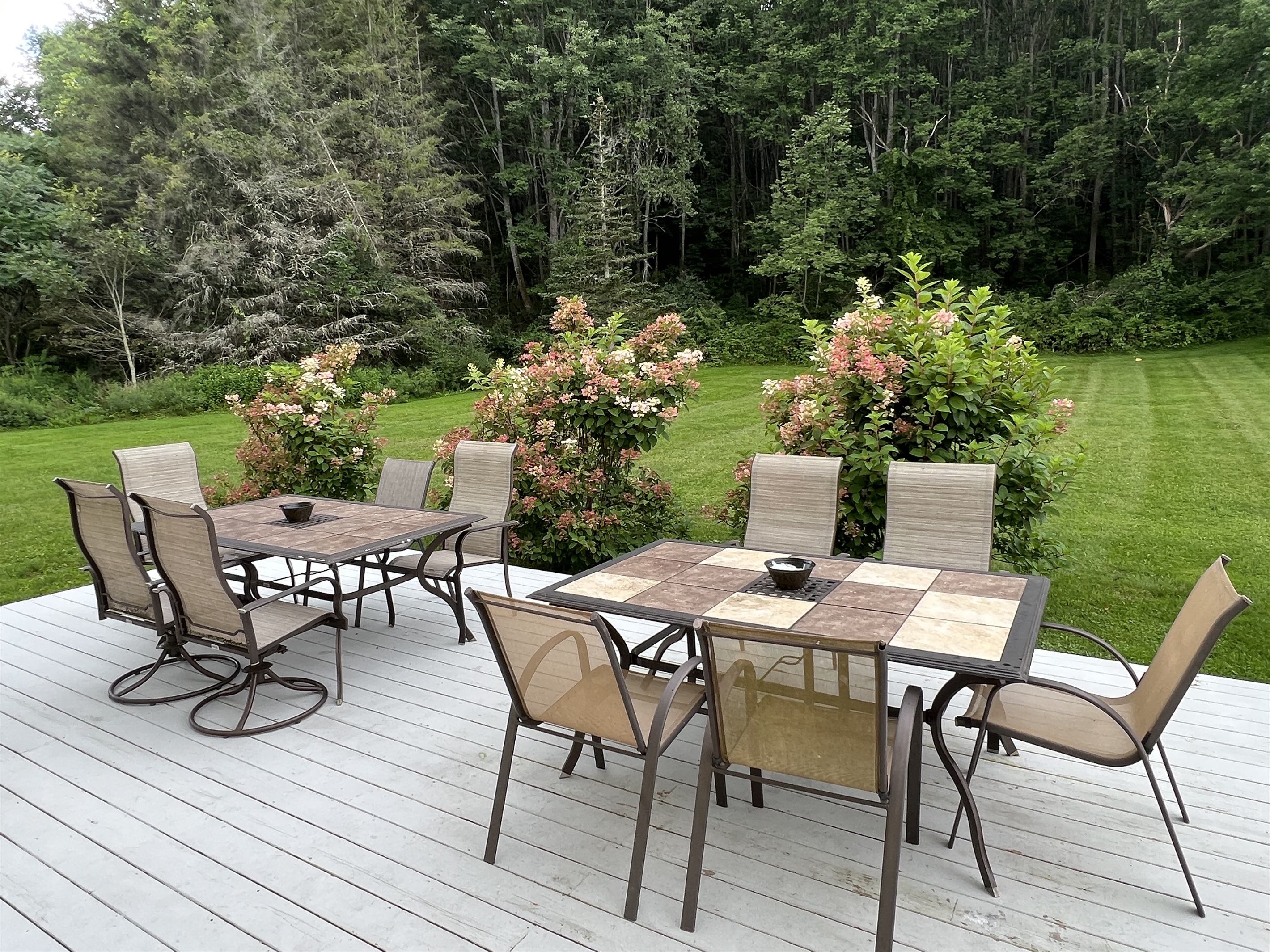 The Federal House Apartment 2 shared with apt 1  back deck with outdoor seating .