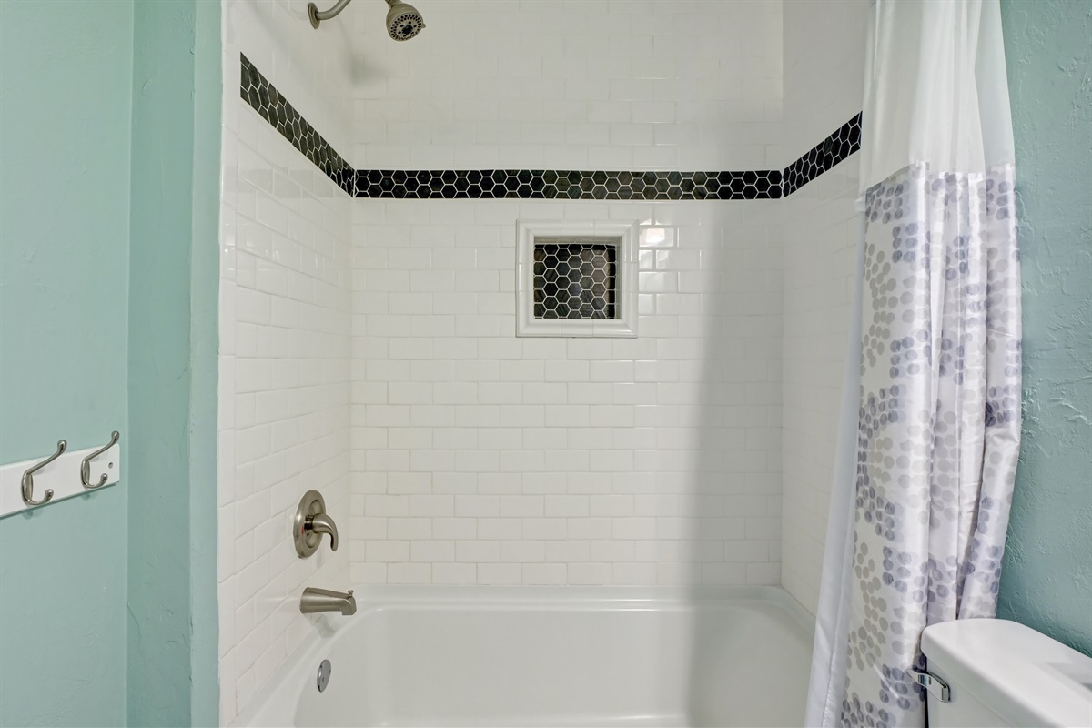 Hall bathroom with tub/shower combo