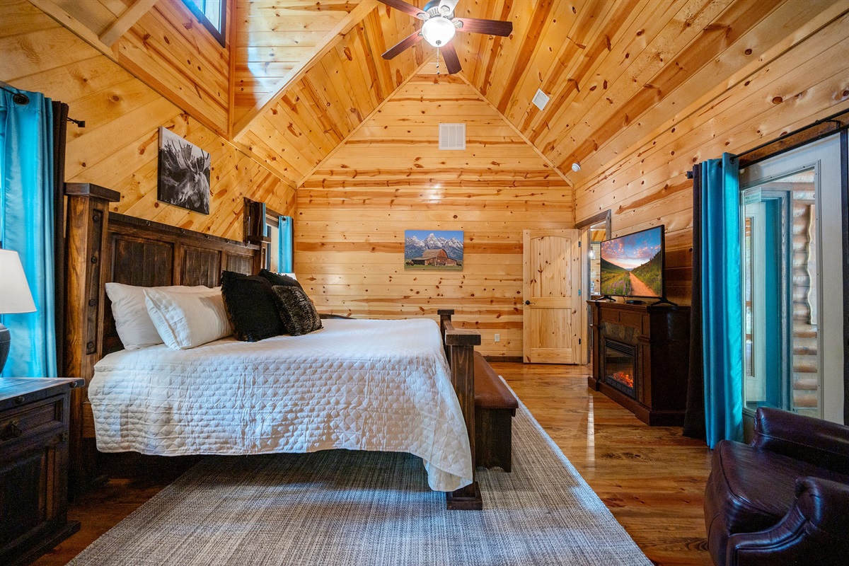 Master suite features a king bed and sits off the back deck and main living.
