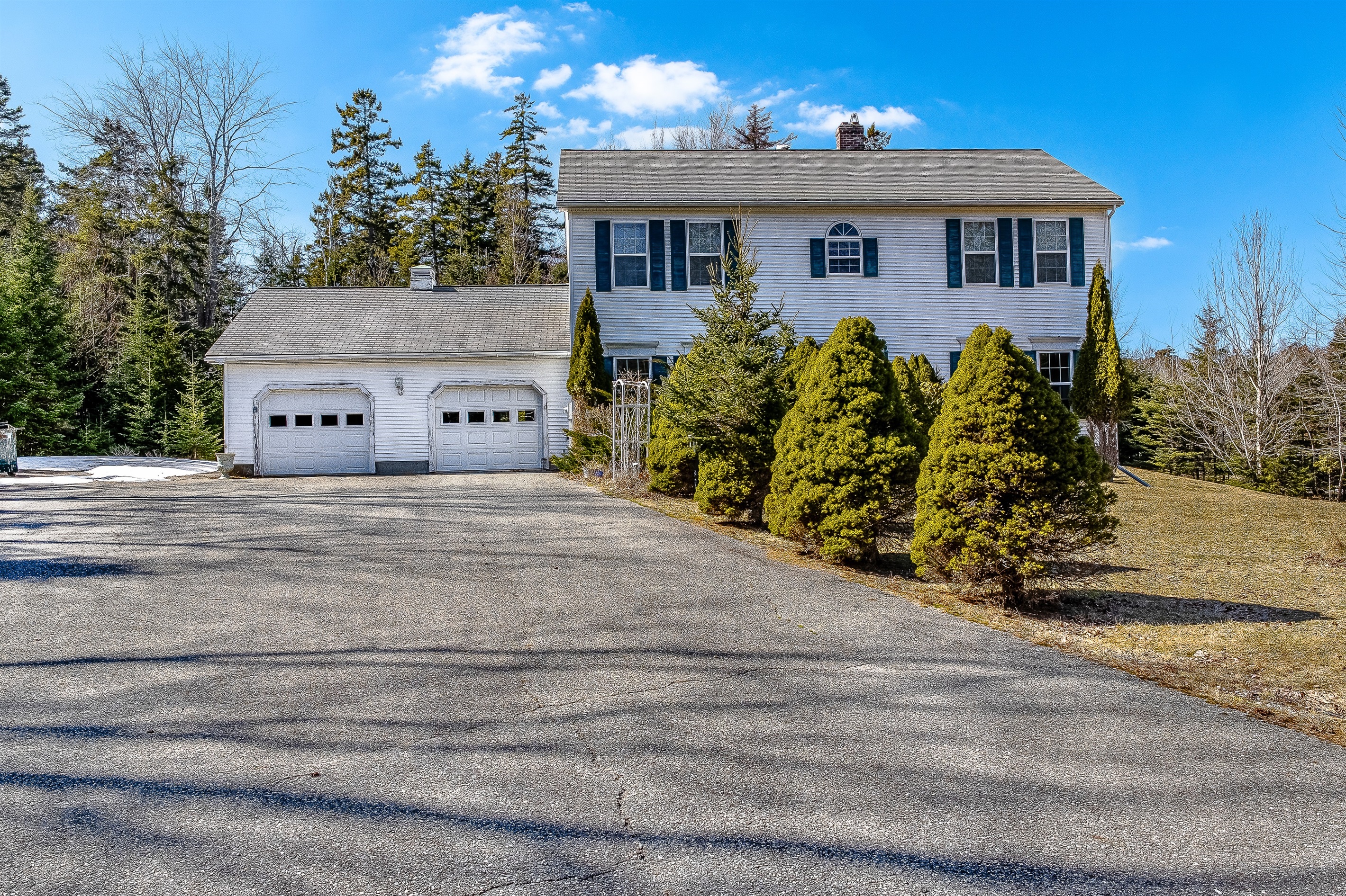 Escape to Seven Peaks Ridge, a private Southwest Harbor estate on the quiet side of Acadia. This colonial retreat features a 2-car garage and a large driveway with ample parking for boats or trailers—perfect for your next Mount Desert Island adventure.