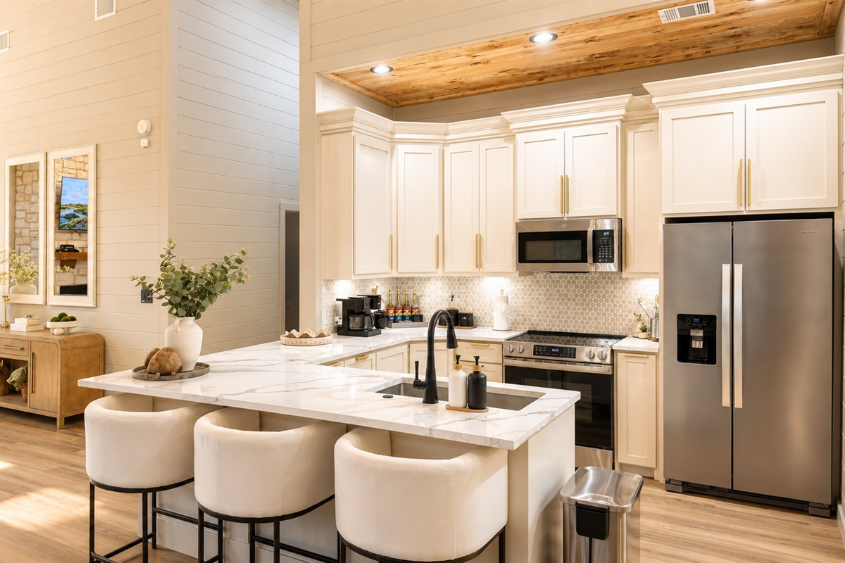Gourmet Kitchen: Bright, modern space with sleek appliances and elegant marble countertops!