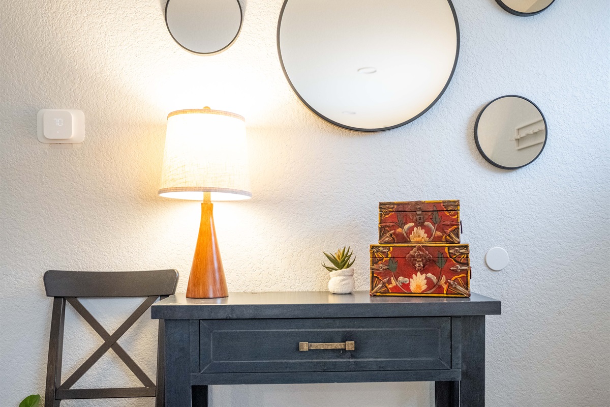 Welcoming entry with stylish console and decor