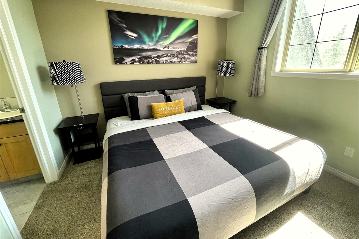 Master Bedroom with ensuite bathroom. Mountain view, and 55" TV.  Located on the 2nd floor.