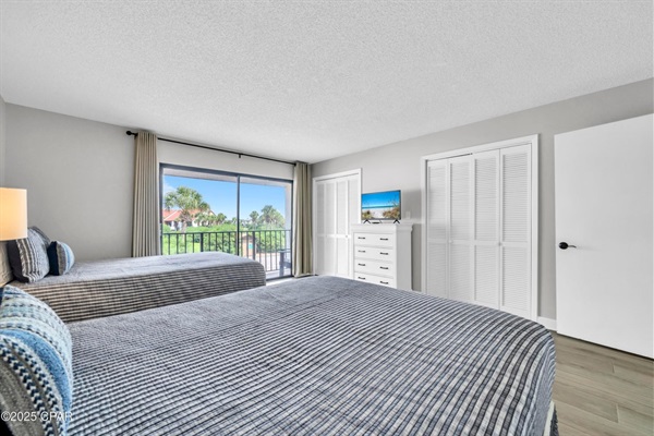 Guest room with balcony and smart TV