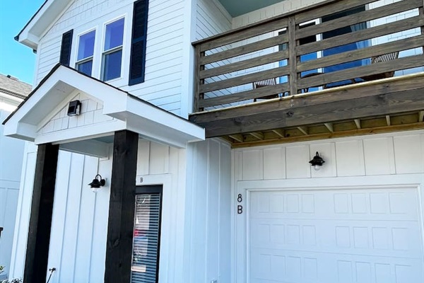 Convenient covered garage space with easy private access to the home.