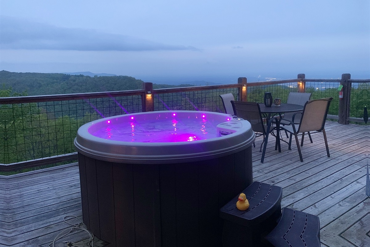 End the day in the hot tub while the mountains fade into evening.