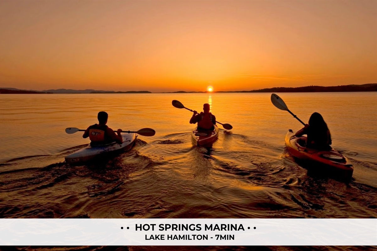 Rent paddle boards or kayaks at Lake Hamilton marina and go explore the 