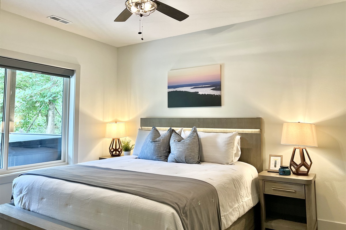 Lower King bedroom with built-in headboard lighting