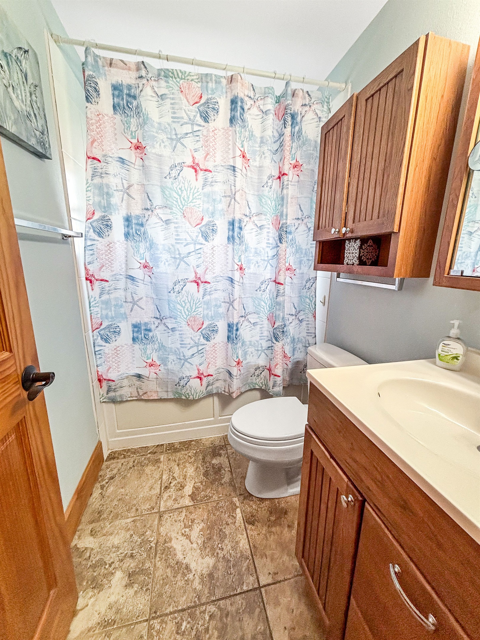 Bathroom is Side A has a jacuzzi tub/ shower combo