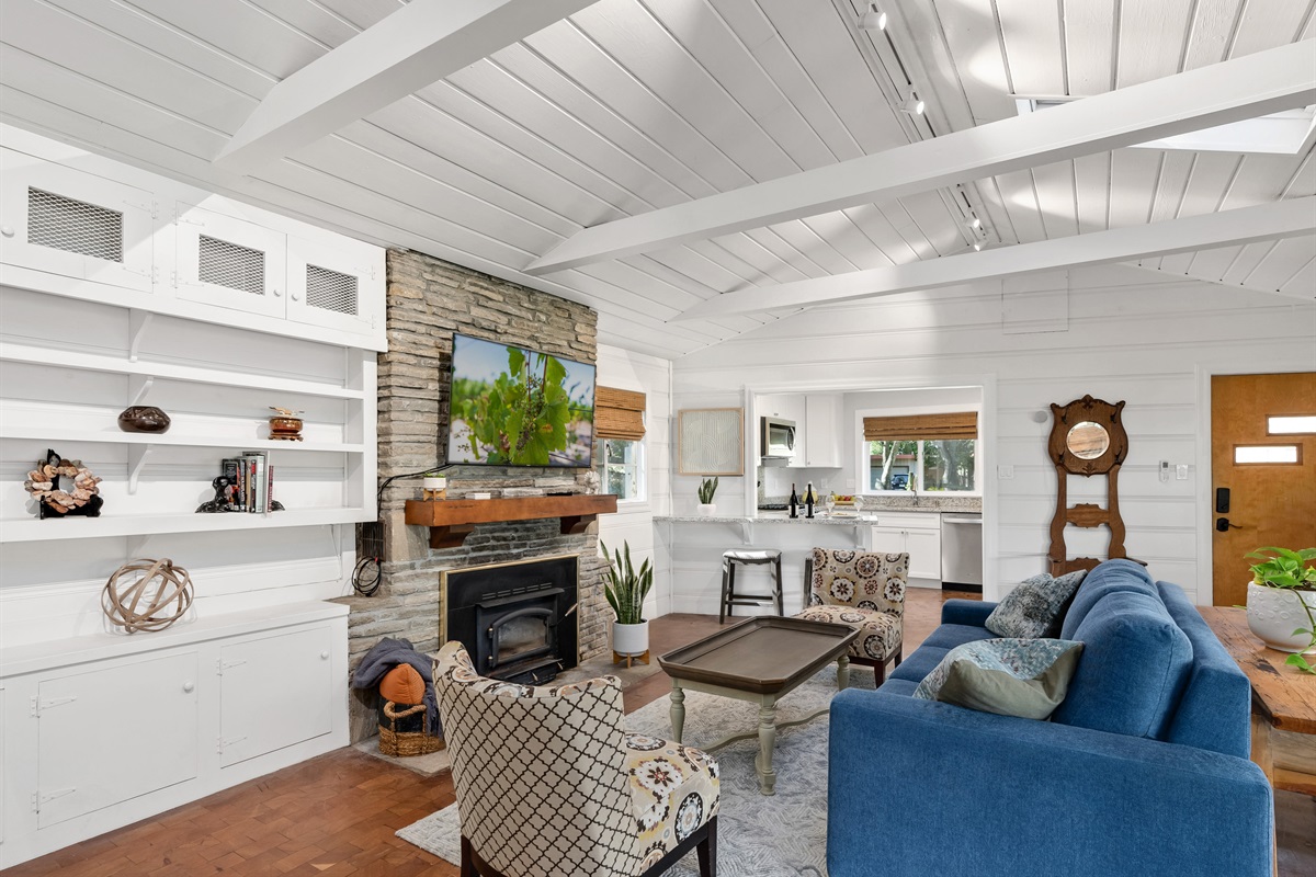 Cozy yet refined living space with smart TV.