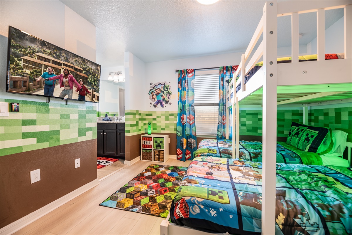 The Minecraft Bunk Room has a full over two twin beds