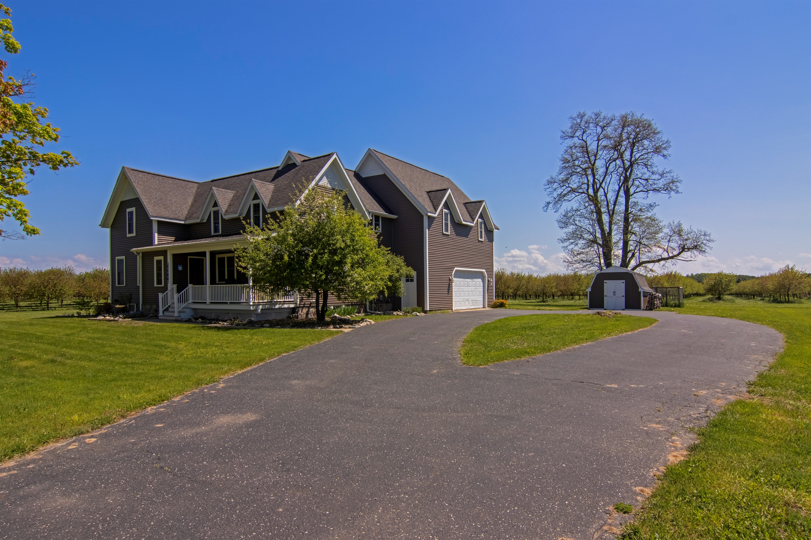Easy access with a wide drive and garage.