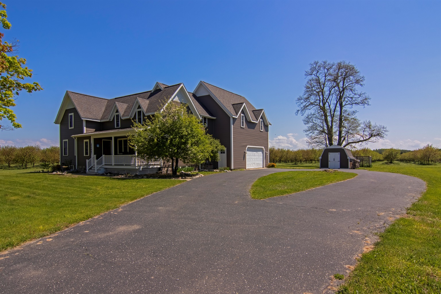 Easy access with a wide drive and garage.