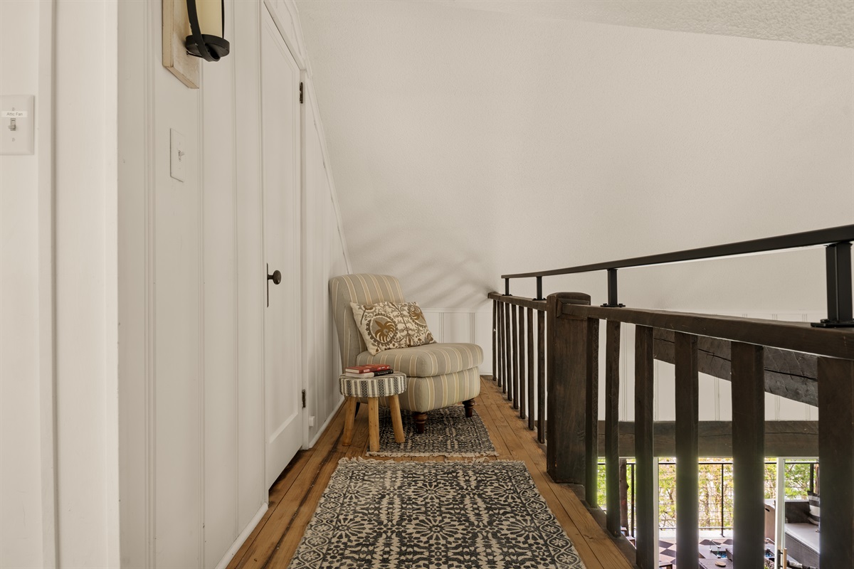 Upper-level nook for reading or relaxing.