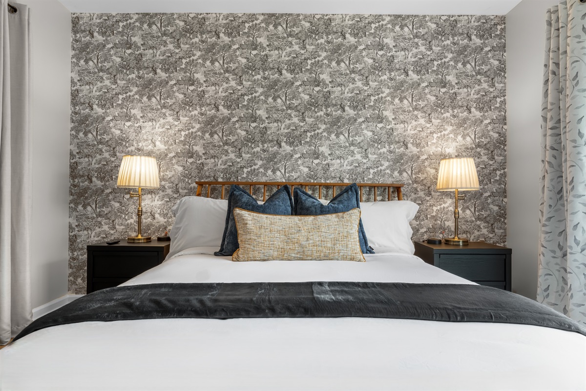 Beautifully styled bedroom with a plush, relaxing vibe.