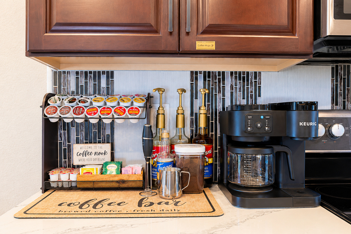 Indulge in the ultimate coffee experience at our coffee bar. Choose from an array of K-cups, enjoy the rich flavor of French press or drip coffee, or opt for a soothing cup of tea. Complete with an assortment of syrups and accoutrements.