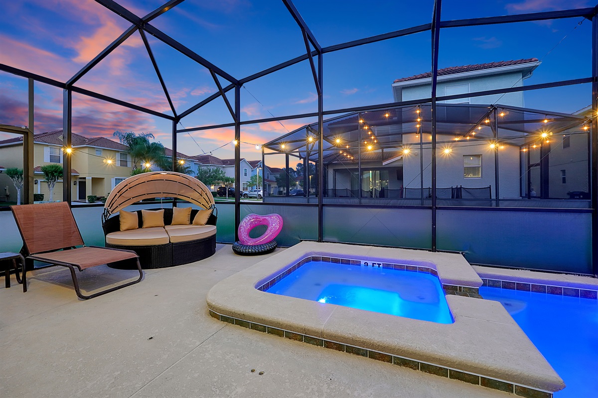 Enclosed saltwater spa and pool lounge area that’s been recently resurfaced, surrounded by privacy screens and optional heating (for a minimal fee)