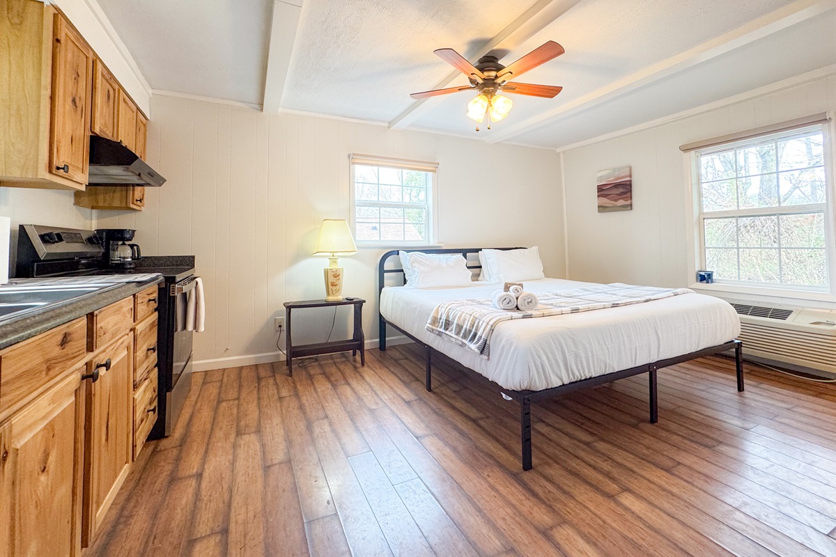 The separate apartment suite features a comfy King size bed with cooling memory foam gel and high thread count bedding. There is a smart TV, a small ensuite bathroom, refrigerator, coffee maker, and some kitchen items. Mostly for drinks and such.
