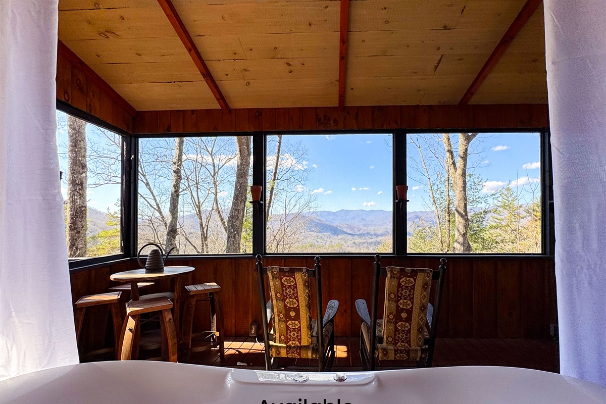 Our amazing outdoor screened in deck!