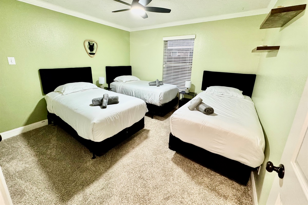 Spacious and comfortable 3 twin beds with plenty of storage for your stay.
