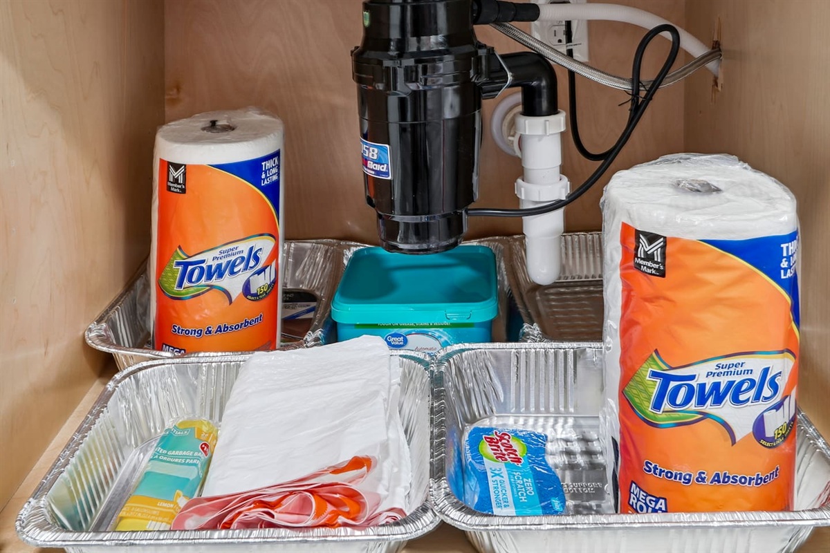 Full kitchen thoughtfully stocked with everything you may need including cookware, utensils, dishes, and essential appliances perfect for preparing meals and enjoying a true home-away-from-home experience.