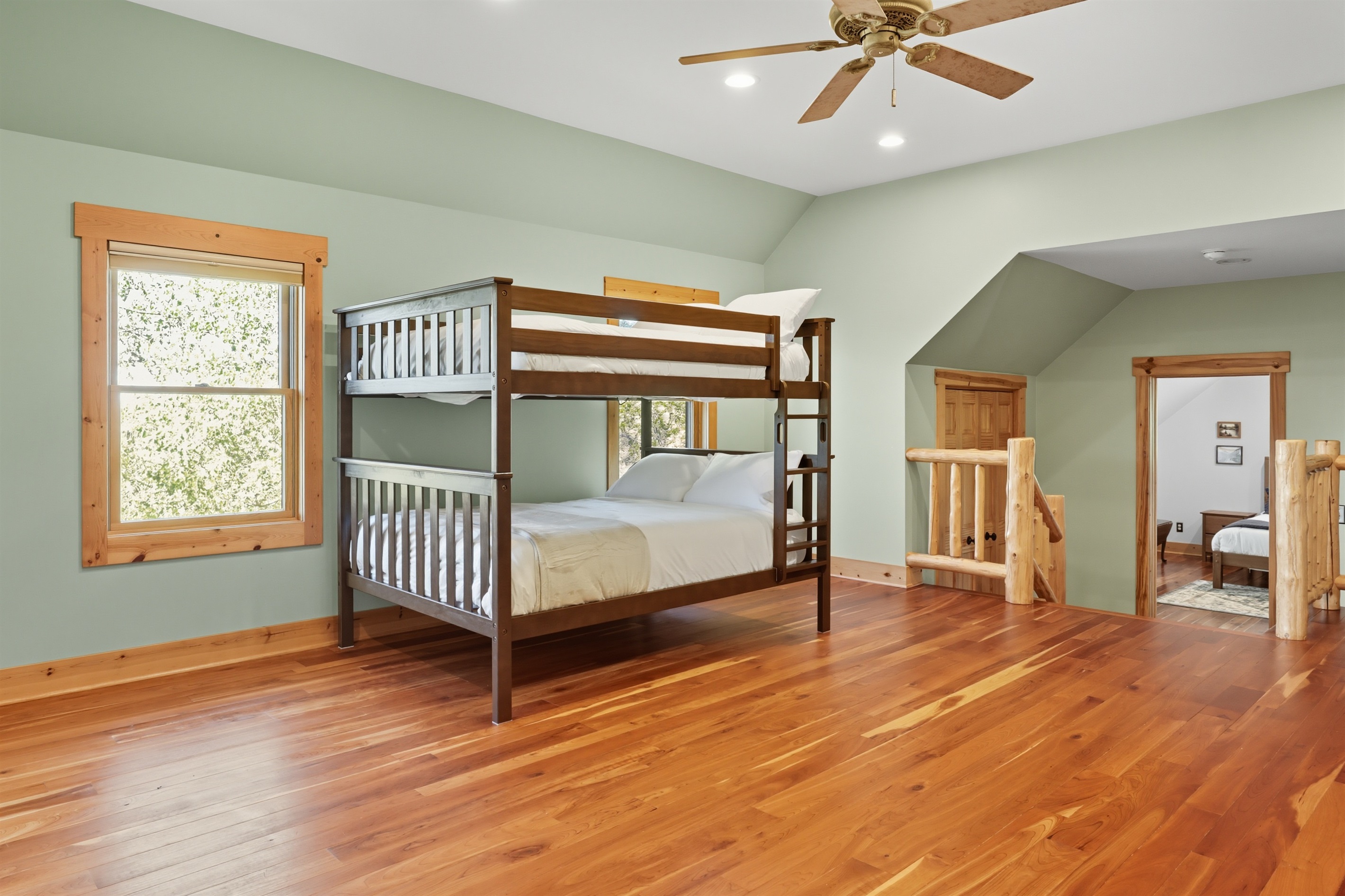 Bright bedroom with classic wooden furnishings.