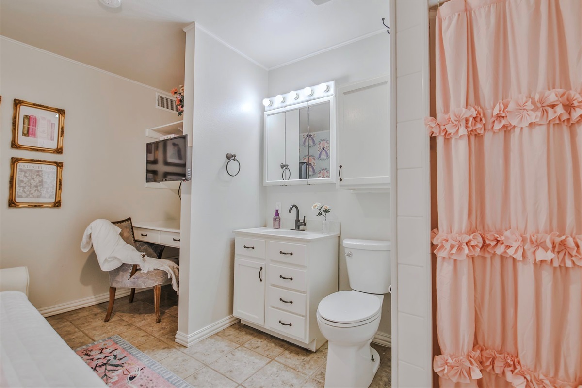 The Queen Charlotte Room: A jewel box of a chamber for the most beloved member of the ton. Featuring a twin bed, smart TV, and in-room toilet and shower—plus a desk for correspondence