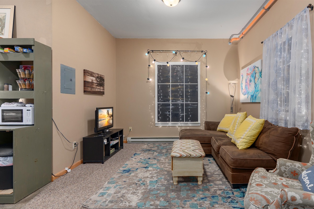 Eclipse's interior living room offers fun imaginary windows with all the lights of the night sky!