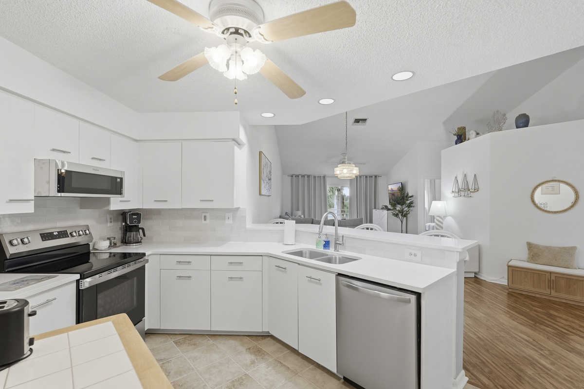 Fully equipped with modern appliances and essential cookware, the kitchen makes preparing meals easy, whether you're brewing your morning coffee or cooking a delicious meal for the group.