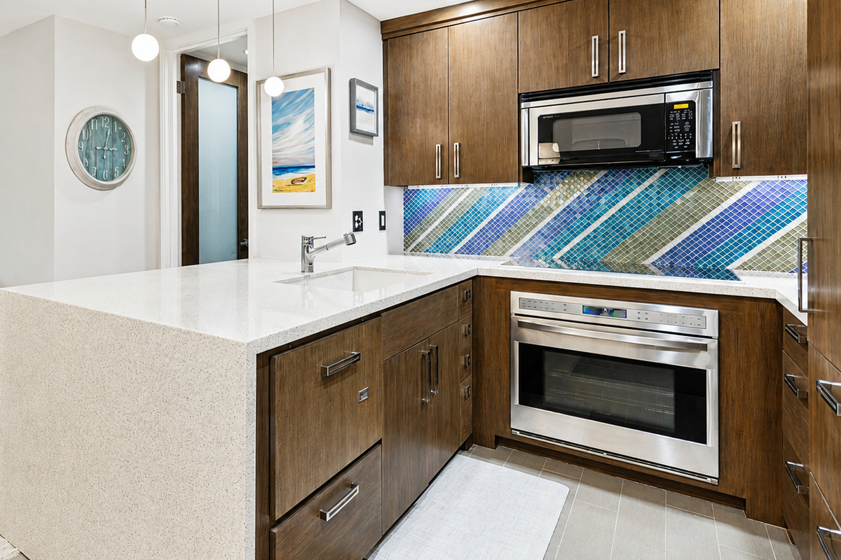 Fisher & Paykel dishwasher, Wolf oven, and Keurig coffee maker
