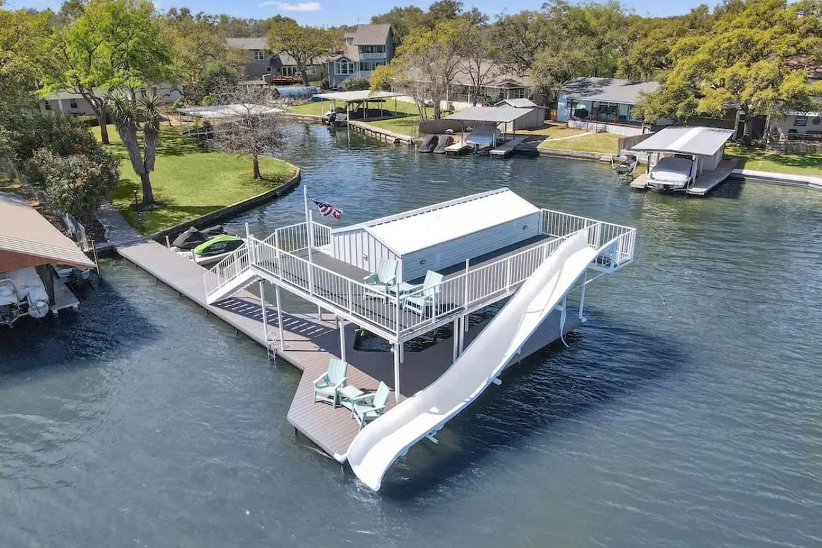 Aerial view of lakehouse dock and waterslide