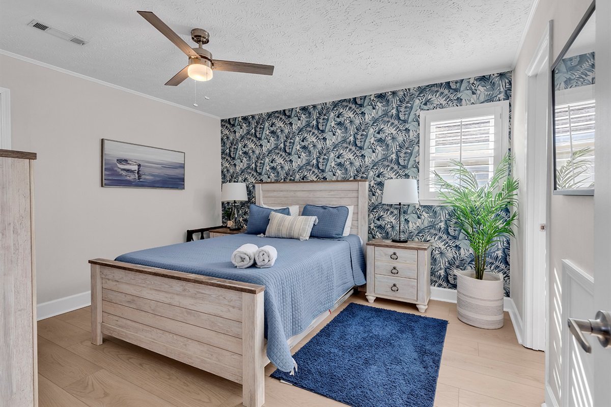 Bedroom 4 queen bed with nightstand