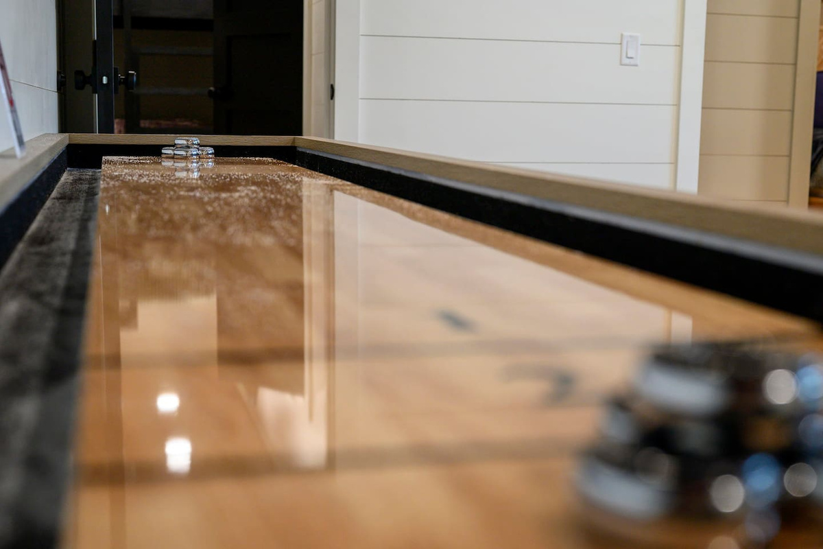 Rainy day or late night? Keep the fun going with a game of shuffleboard just steps from the bunk room.
