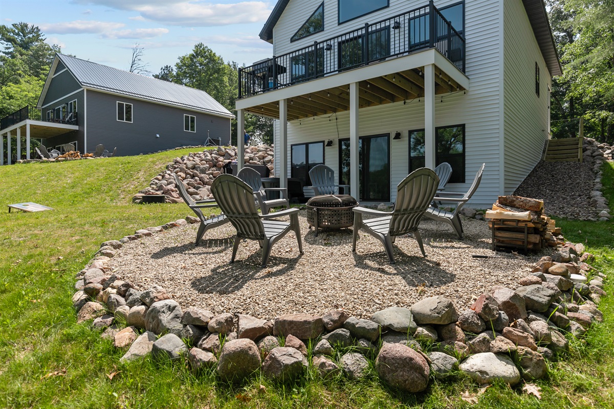 The fire pit area is perfect for winding down after a day on the water—roast marshmallows, share stories, and soak up the cozy lake night vibes.