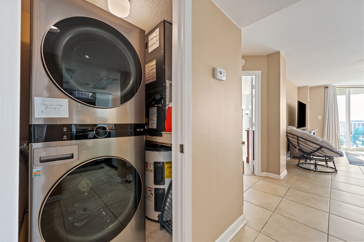 In-unit washer and dryer conveniently located off the hallway, making longer stays and beach days easy and stress-free