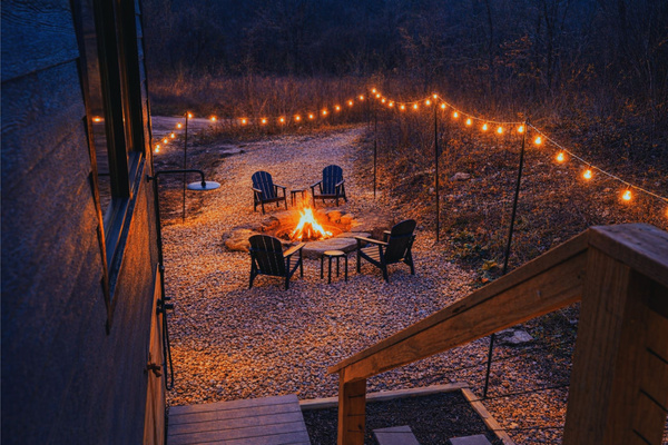 Cozy up by the natural stone firepit next to the sound of the creek. Complimentary firewood is provided.