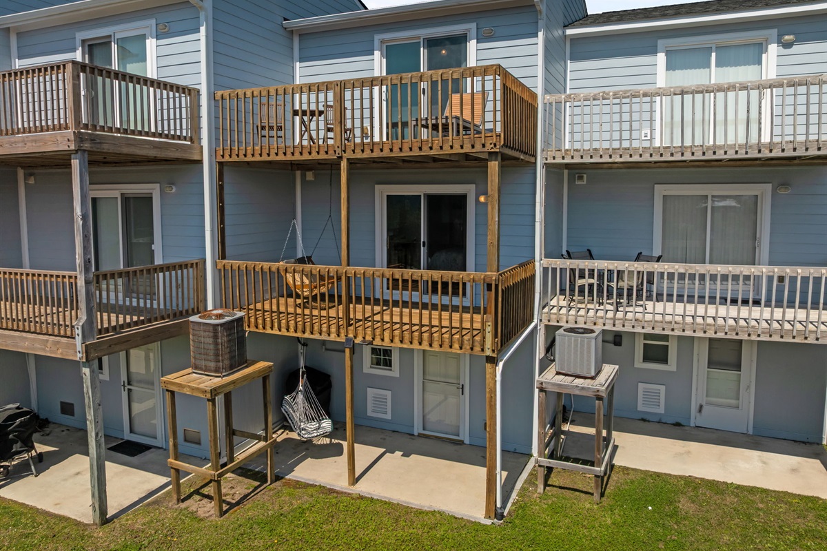 Rear decks and outdoor spaces at the property
