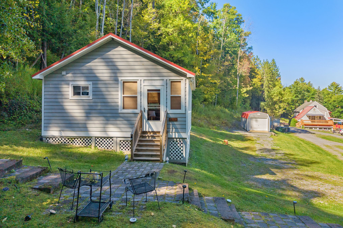 Hatch's Coop - quaint 1 bdrm cottage. Hatch's Nest, Perch and Main Lodge are visible is the background. Rent the whole compound or only a few houses, its up to you! 