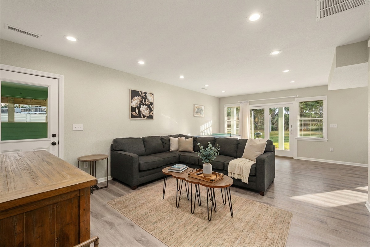 Open and inviting living space with ample seating and natural light.