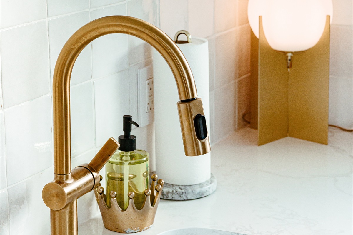 The full kitchen in the cottage has all the cookware and amenities you need to craft tasty meals together.