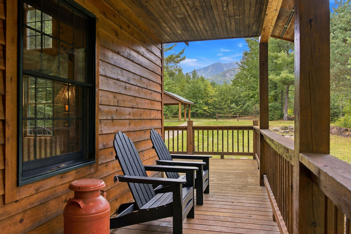 Relax on the covered porch while taking in the incredible views of Whiteface Mountain.