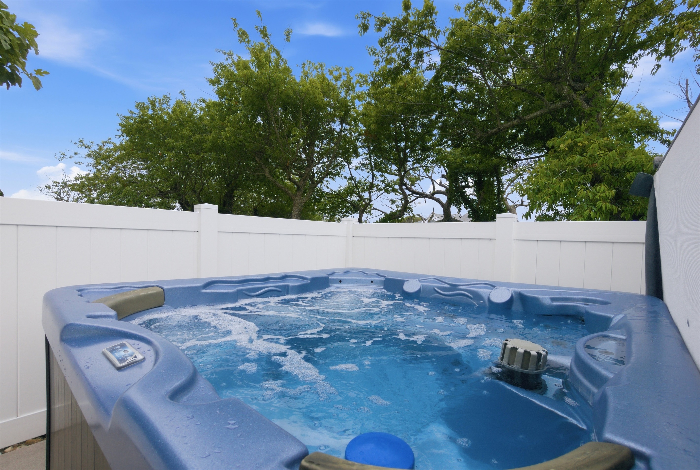 Private hot tub perfect for relaxing after a day at the beach.