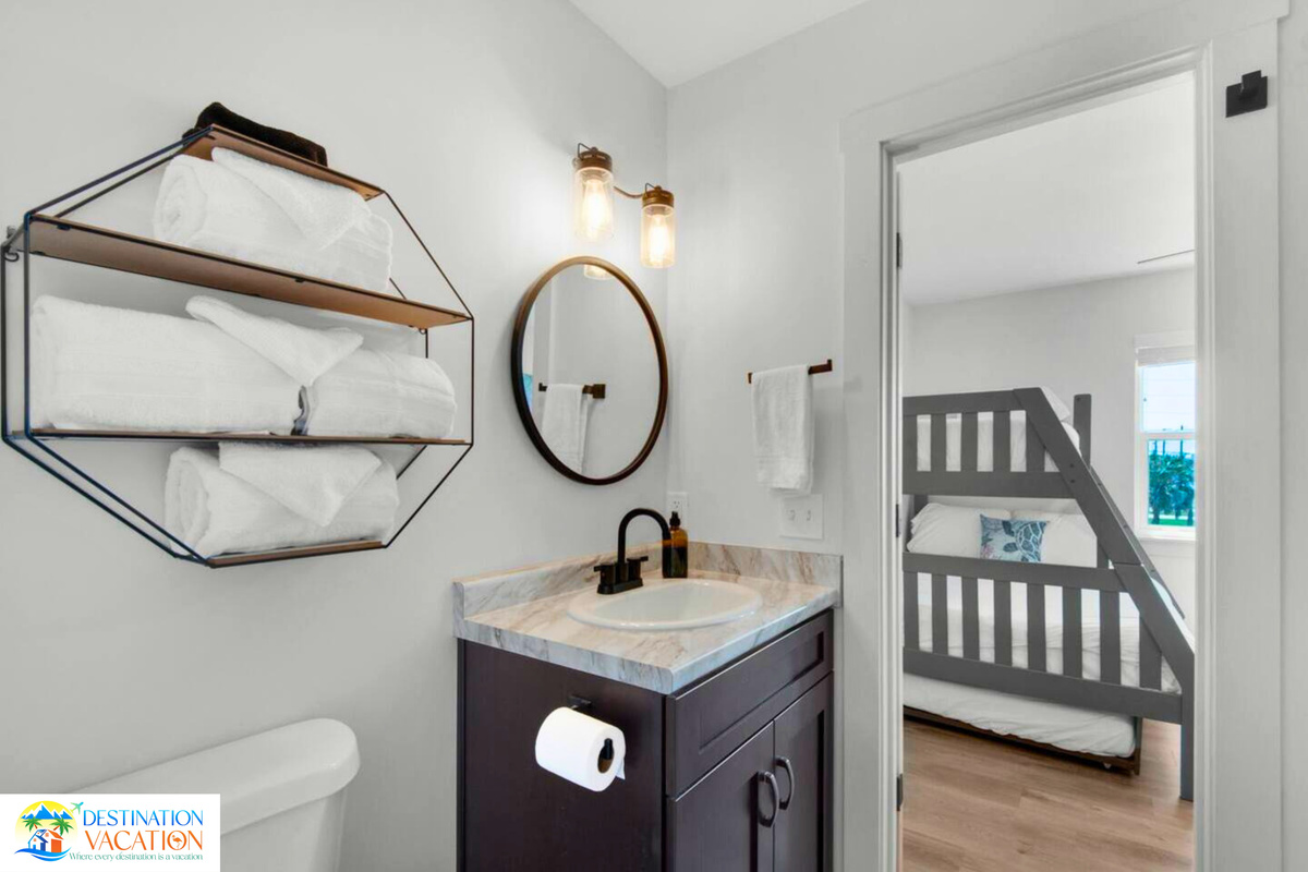 Stylish bathroom adds comfort to your beach escape.