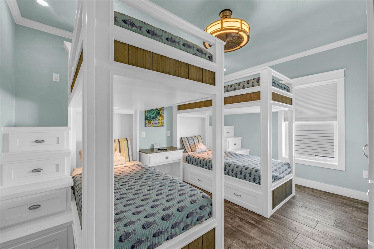Crystal Paradise Bedroom 5: Spacious bunk room with multiple beds, perfect for kids or friends.