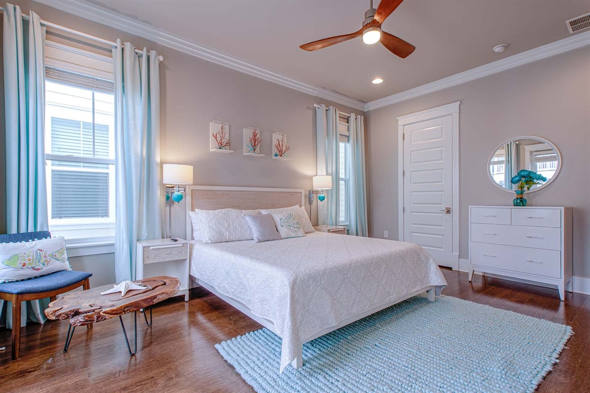 Master suite with smart TV, walk-in closet, and en-suite bathroom