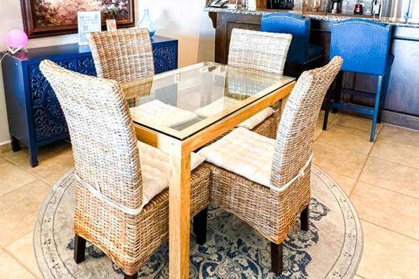 Dining table with comfortable seating for four.