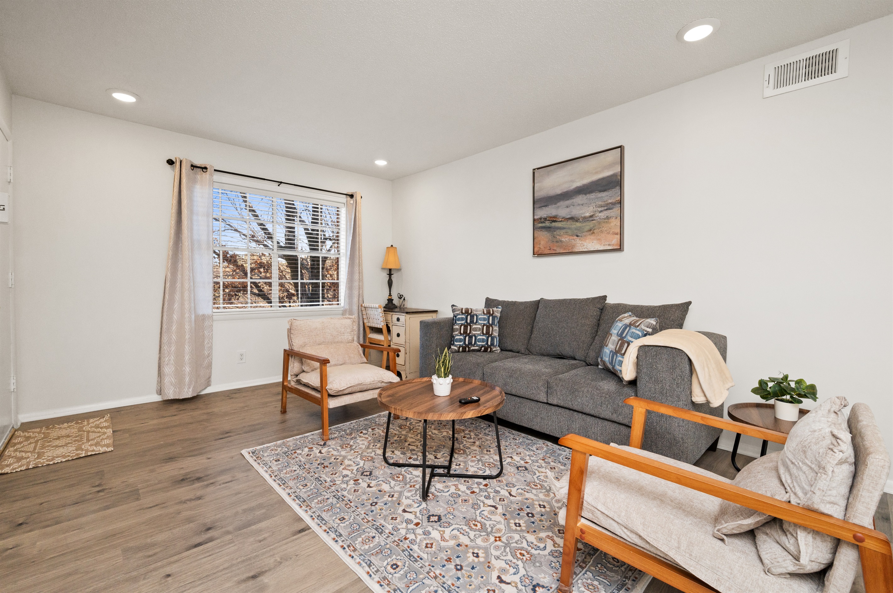 The living room is the perfect place to unwind or get into that deep conversation you've been wanting to have for a while, but just haven't found the chance to yet. You also have a lovely view of the wooded areas just outside your doorstep.