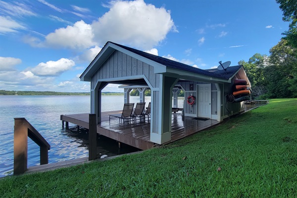 Private dock with 4 kayaks, 2 SUPs, and 1 Canoe