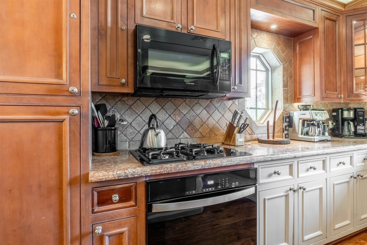 Well-equipped kitchen includes an espresso machine and plenty of space to start the day right.